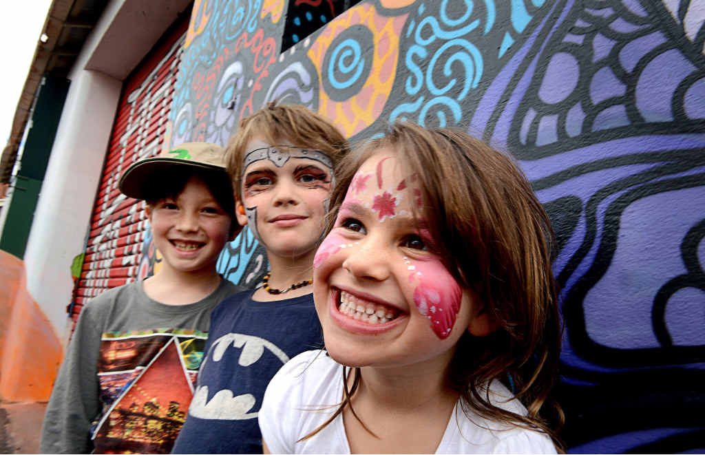 PARTY TIME: Istvan Kohary, 8, Oscar Nissen, 7, and Honey Moon Nissen, 5, all of Tuntable Creek, enjoy the Back Alley Gallery party on Saturday. PARTY TIME: Istvan Kohary, 8, Oscar Nissen, 7, and Honey Moon Nissen, 5, all of Tuntable Creek, enjoy the Back Alley Gallery party on Saturday.